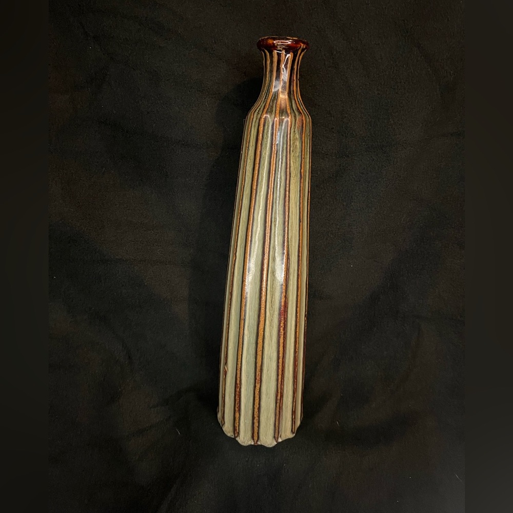 Asymmetrical green and brown glazed vase